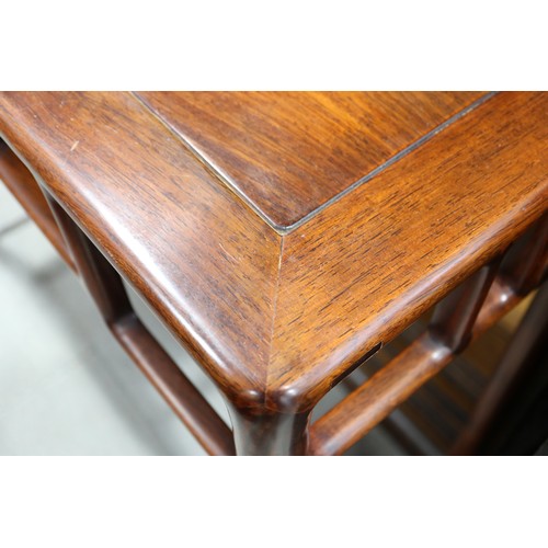 307 - A Chinese hardwood console table, on slender turned supports, 38