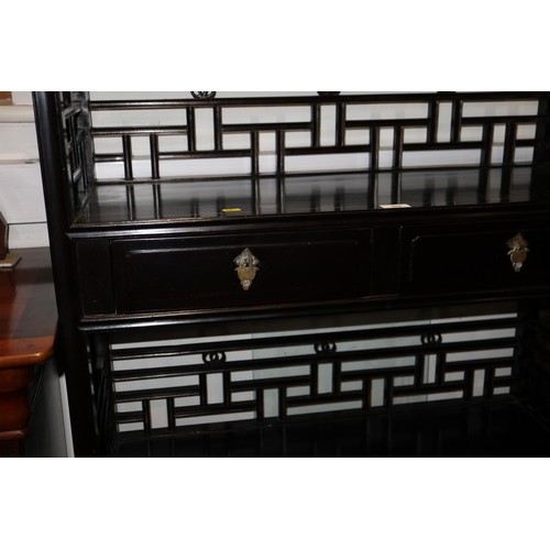 308 - A Chinese ebonised hardwood open bookcase, fitted two centre drawers, 34