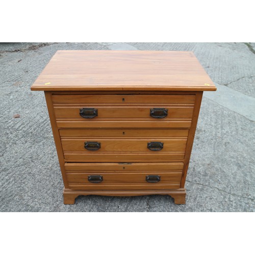 286 - A satin walnut chest of three long drawers, 33