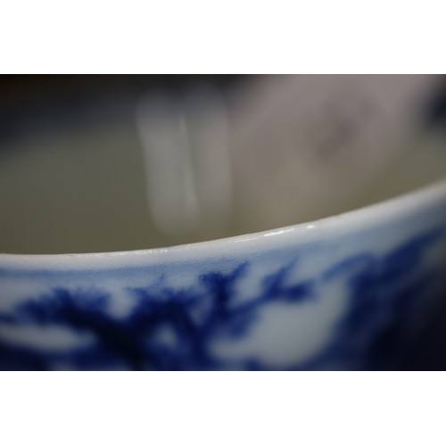 81 - A Nankin Cargo blue and white tea bowl and saucer, 2 1/2