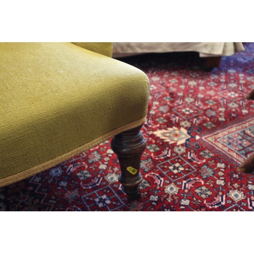 265 - A late 19th century tub chair, button upholstered in an old gold Dralon, on turned and castored supp... 