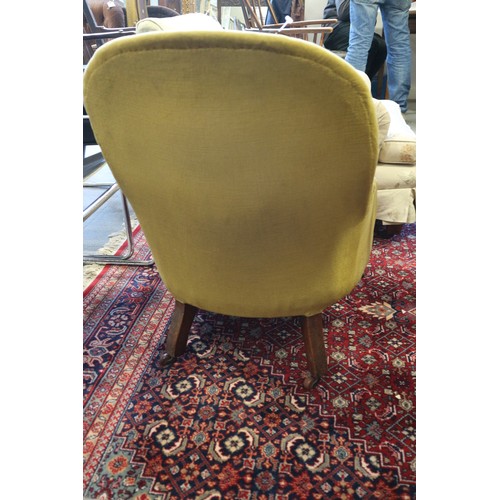 265 - A late 19th century tub chair, button upholstered in an old gold Dralon, on turned and castored supp... 