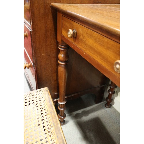 335 - A mahogany side table, fitted two drawers, on turned supports, 48