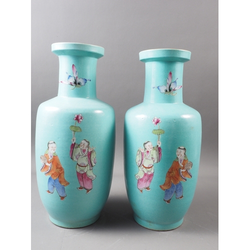 105 - A pair of Chinese porcelain baluster vases with figure, beast and butterfly decoration on a teal gro... 