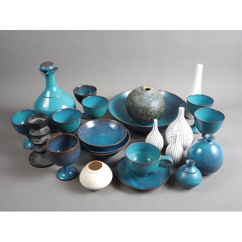 18 - Annette Fuchs: a collection of turquoise glazed studio pottery bowls and goblets, three studio potte... 