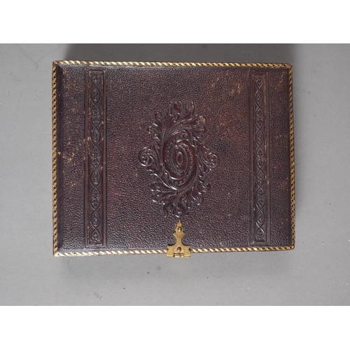 212 - A Victorian Ambrotype portrait of two girls with gilt chain details, in morocco leather case