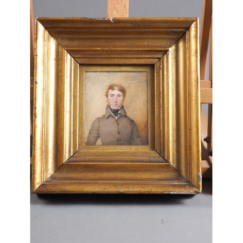 479 - An early 19th century portrait miniature of a gentleman in a brown coat, 3 1/2