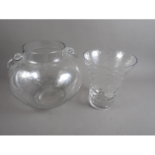 63 - A bulbous two-handled glass vase, 11 1/2