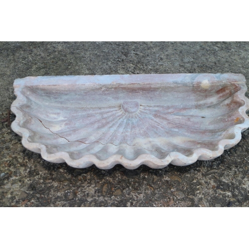 674 - A carved marble shell-shape bowl, 21