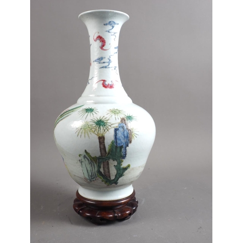 82 - A Chinese porcelain famille rose bulbous vase, decorated figure and Kylin with bats and clouds, seal... 