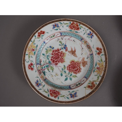 83 - A Chinese porcelain famille rose shallow dish, decorated numerous figures in a landscape, 8 1/4