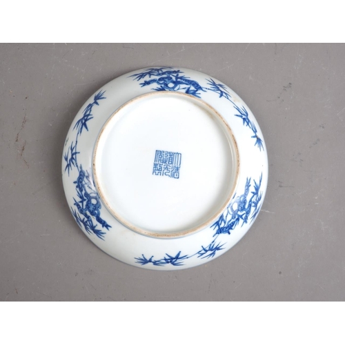 91 - A Chinese blue and white porcelain dish, decorated three phoenix and arabesques, seal mark to base, ... 