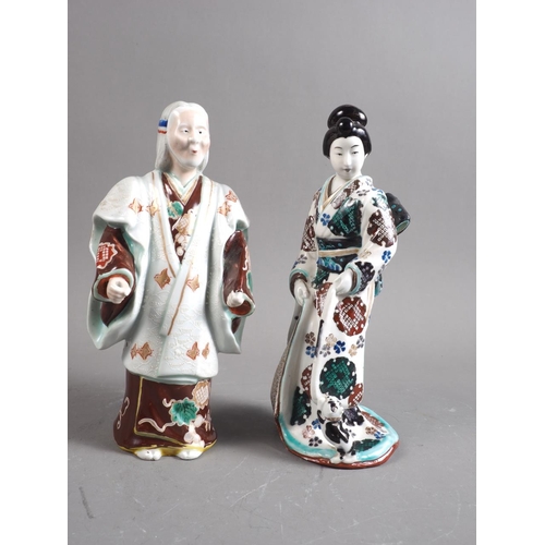 96 - A pair of Japanese porcelain actor figures, 8 1/2