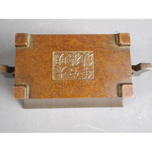 112 - A Chinese bronze square-section flared censer, six-character mark to base, 4 3/4