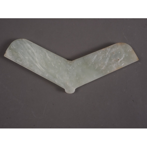 113 - A Chinese pale celadon jade angular pendant, decorated two dragons, 6 3/4