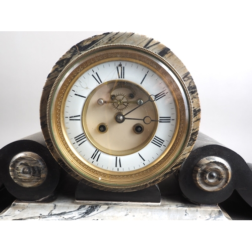 140 - A black slate and grey marble mounted clock with cylindrical movement, 12