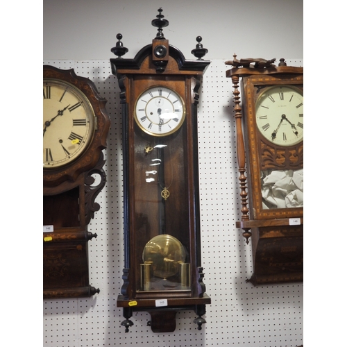 143 - A Vienna type regulator wall clock, in walnut and ebonised case, height 42