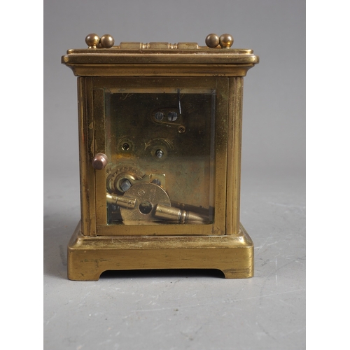 150 - A carriage clock with gilt brass case, 4