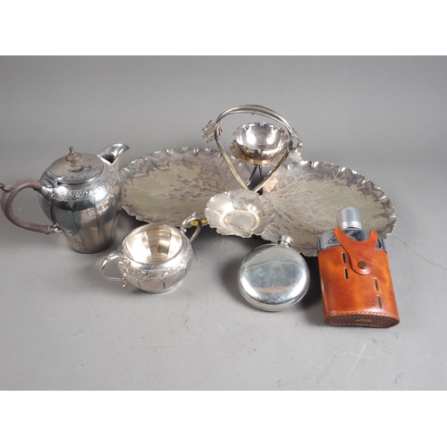 301 - A silver plated leaf-shape strawberry and cream set, a plated solo teaset, two hip flasks and two di... 