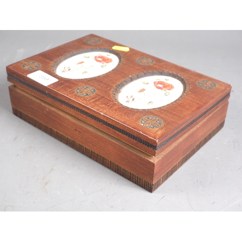 359 - A walnut jewel box, three enamel pill boxes, a collection of enamel charms, etc