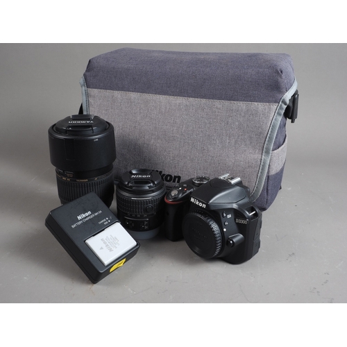 132 - A Nikon D3300 digital SLR Nikkor DX 18-55 3.5-56 lens, and Tamron 70-300 f4-5.6 Telemacro, in case w... 