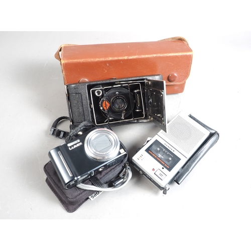 145 - An Agfa folding vest pocket camera and telephoto Satz-Anastigmat lens, in leather case, a Lumix DMCT... 