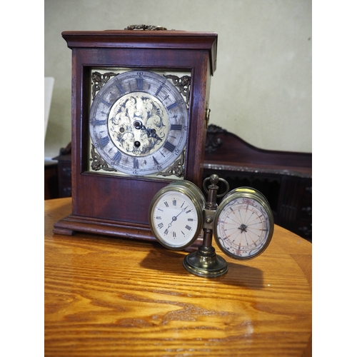 155 - A mahogany cased bracket clock with brass dial and silvered chapter ring, and a brass cased desktop ... 