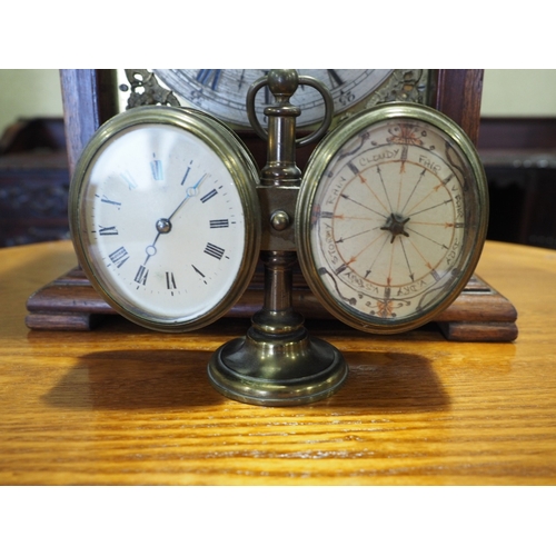 155 - A mahogany cased bracket clock with brass dial and silvered chapter ring, and a brass cased desktop ... 