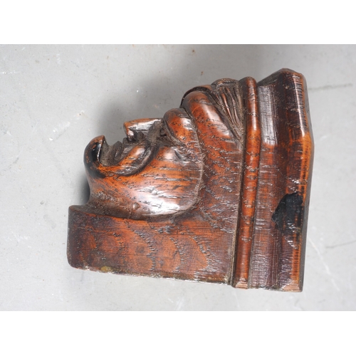 177 - A 17th century carved oak head bracket, 3 1/4