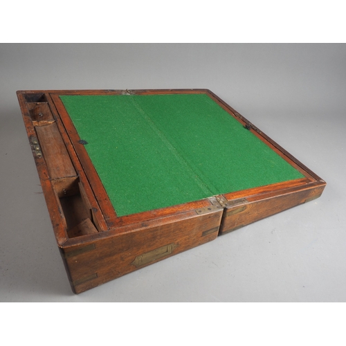 185 - A 19th century mahogany and brass mounted writing box with fitted interior and drawer, 18 1/2