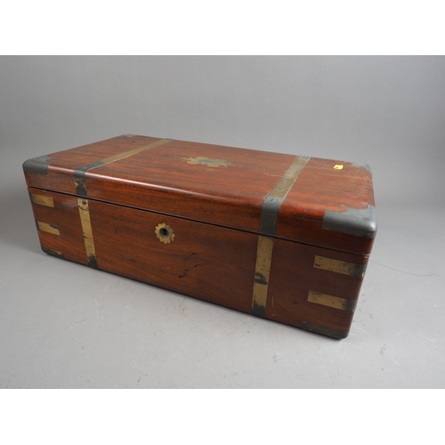 188 - An early 19th century mahogany and brass mounted writing box with part fitted interior and drawer, 2... 