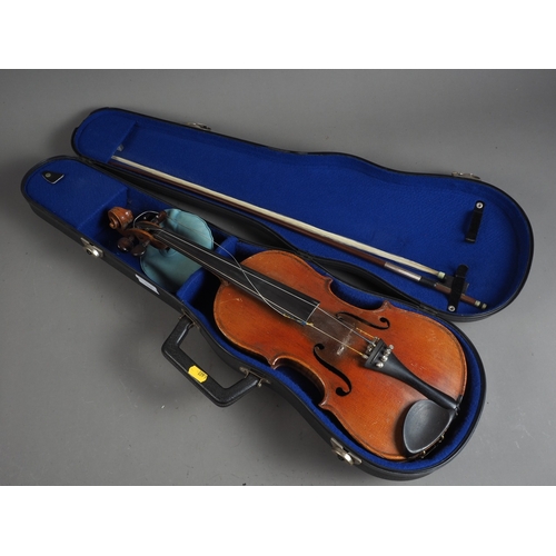 213 - A Student's violin and bow, in case