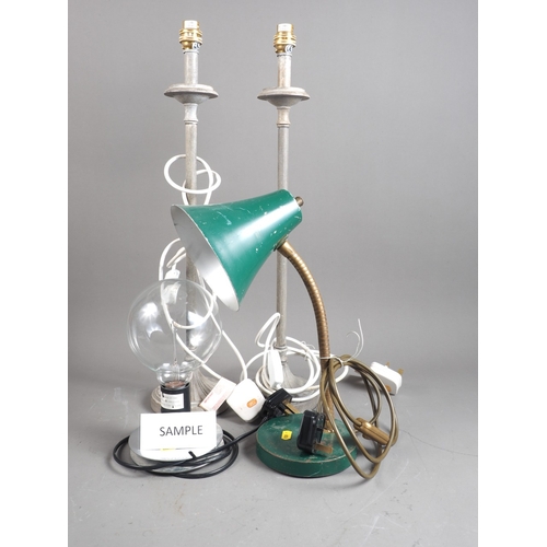 246 - A Continental green enamelled desk lamp, 14