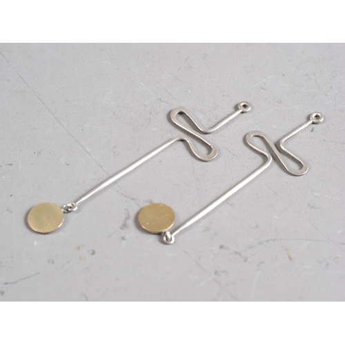 347 - Wendy Ramshaw: a pair of silver and yellow metal drop earrings, 2 3/4