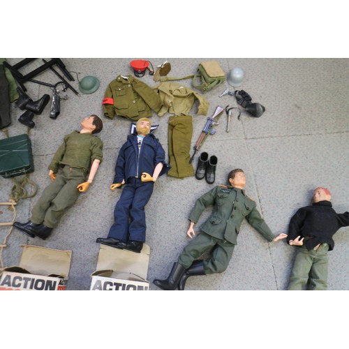 199 - Two boxed Action Man figures, two unboxed, and a collection of accessories and uniforms