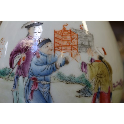 99 - A Chinese porcelain bulbous vase with figures, birds and landscape decoration, 8 1/2