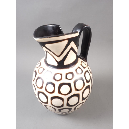 1 - A South American? pottery jug with geometric designs, 11