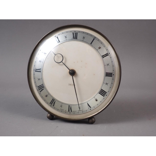 114 - A 1930s oak cased wall clock with eight-day striking movement, 31