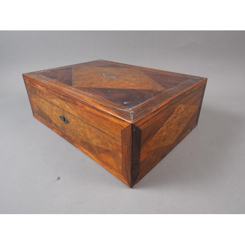 137 - A 19th century marquetry workbox with fitted interior containing a selection of coins, cameos, dague... 