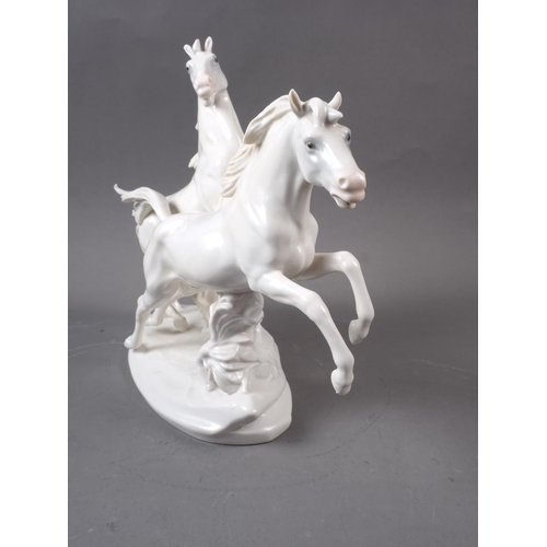 15 - A Karl Ens porcelain model of two galloping horses, 10