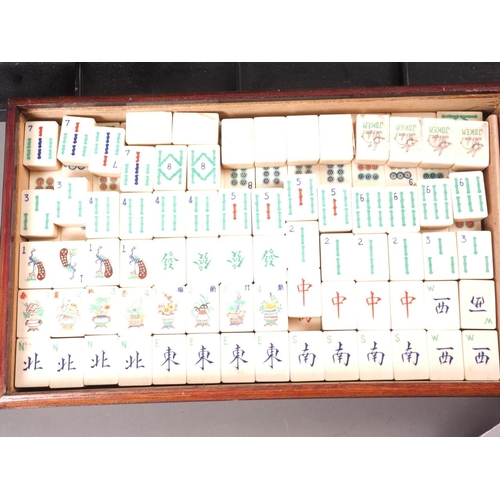 164 - A Mah-jongg set, in hardwood box, and stands, etc