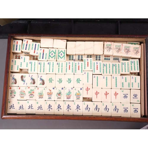 164 - A Mah-jongg set, in hardwood box, and stands, etc