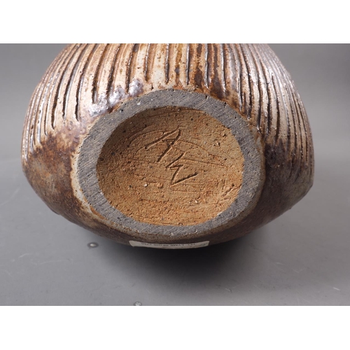 6 - An Alan Wallwork stoneware free-form vase with incised decoration, incised AW mark and paper label, ... 