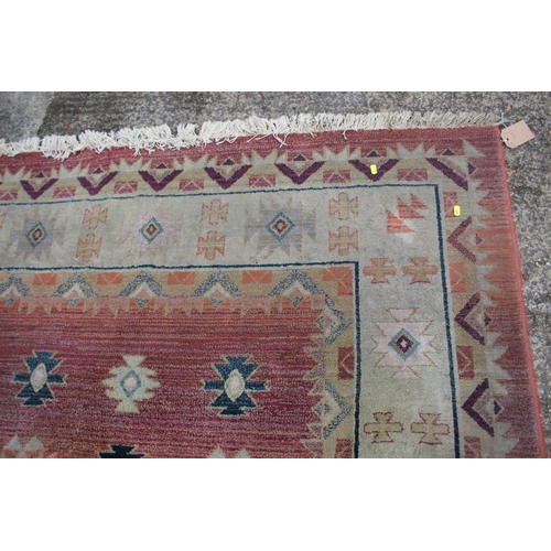 616 - A modern Gabbeh rug of Kazak design, on a light ground, 92