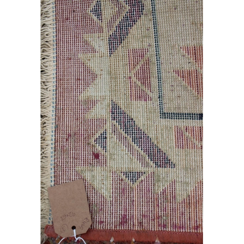 616 - A modern Gabbeh rug of Kazak design, on a light ground, 92