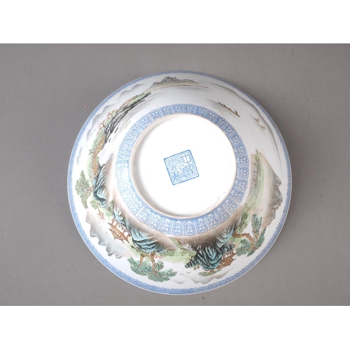 84 - A Chinese eggshell porcelain bowl with landscape decoration, seal mark to base, 9 3/4