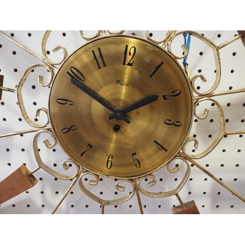 92 - A Paico 1960s star-shaped clock with brass dial and Arabic numerals