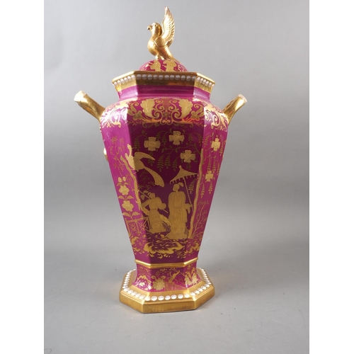 14 - A Spode bone china two-handle octagonal vase and cover with gilt chinoiserie decoration on a pale gr... 