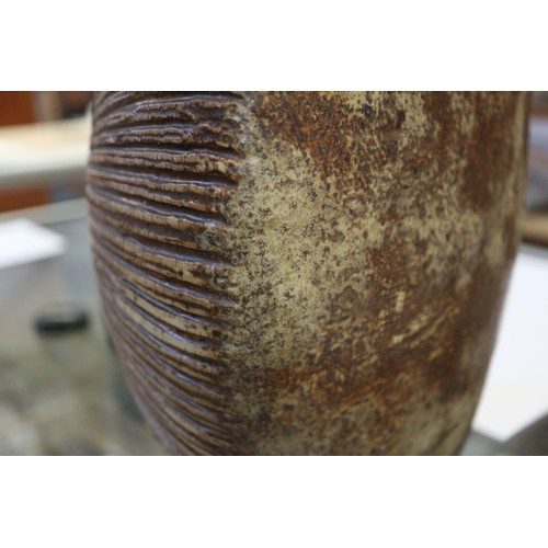 6 - An Alan Wallwork stoneware free-form vase with incised decoration, incised AW mark and paper label, ... 