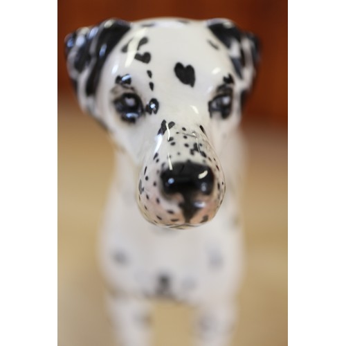 10 - A Beswick seated Dalmatian, 14